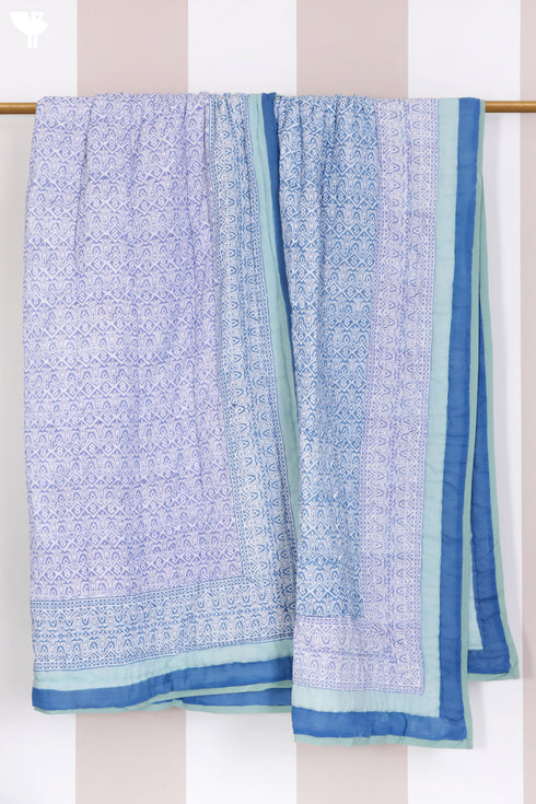 Mulmul Cotton Quilt In Graphic Block Print