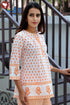 Cambric Cotton Peach Pintucked Top In Floral Print