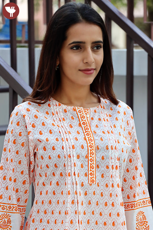 Cambric Cotton Peach Pintucked Top In Floral Print