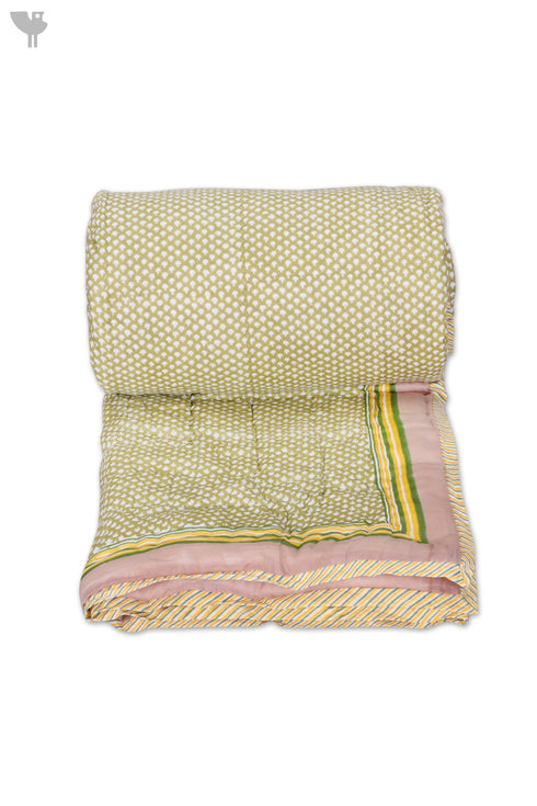 Mulmul Cotton Quilt In Ikat Block Print